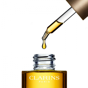 Clarins Lotus Treatment Oil (za kombinovanu do suvu kožu lica) 30ml | apothecary.rs
